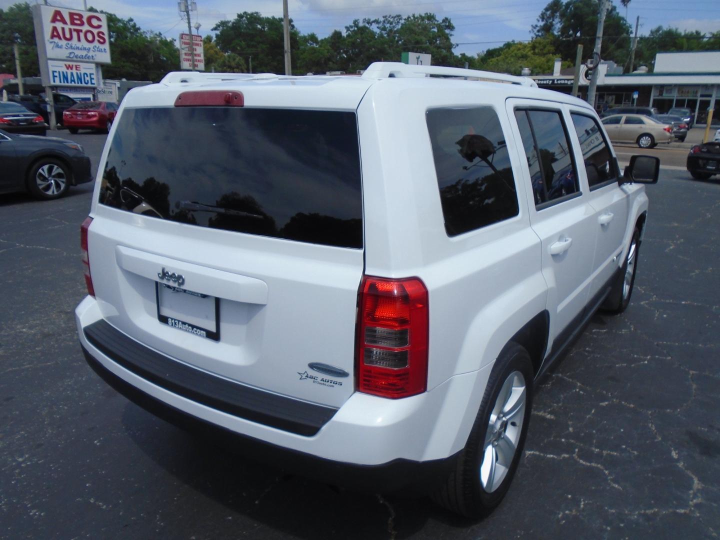 2014 Jeep Patriot Latitude 2WD (1C4NJPFA5ED) with an 2.0L L4 DOHC 16V engine, located at 6112 N Florida Avenue, Tampa, FL, 33604, (888) 521-5131, 27.954929, -82.459534 - Photo#3